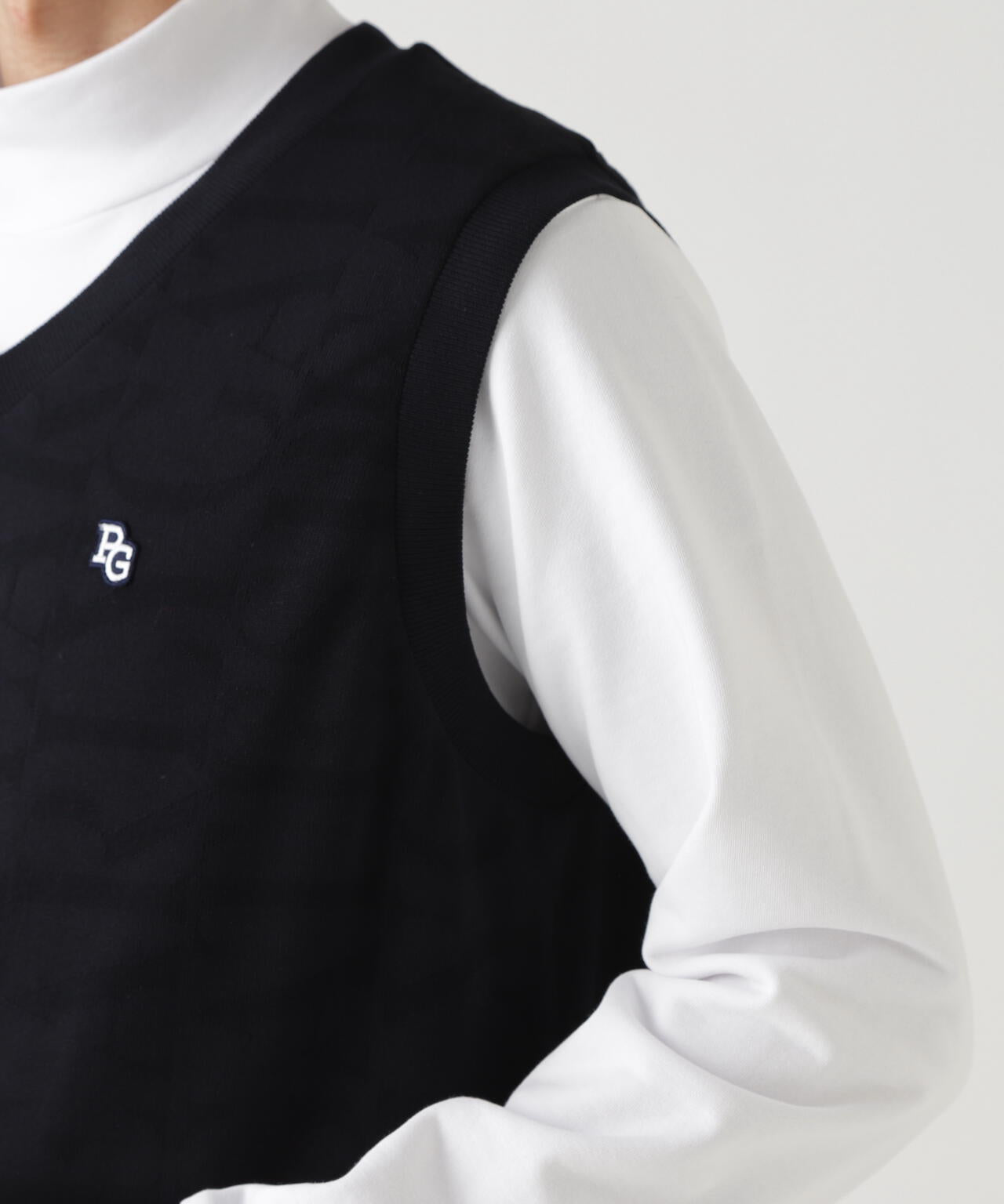 ダブルJQリバーシブルロゴ総柄Vネックニットベストプルオーバー