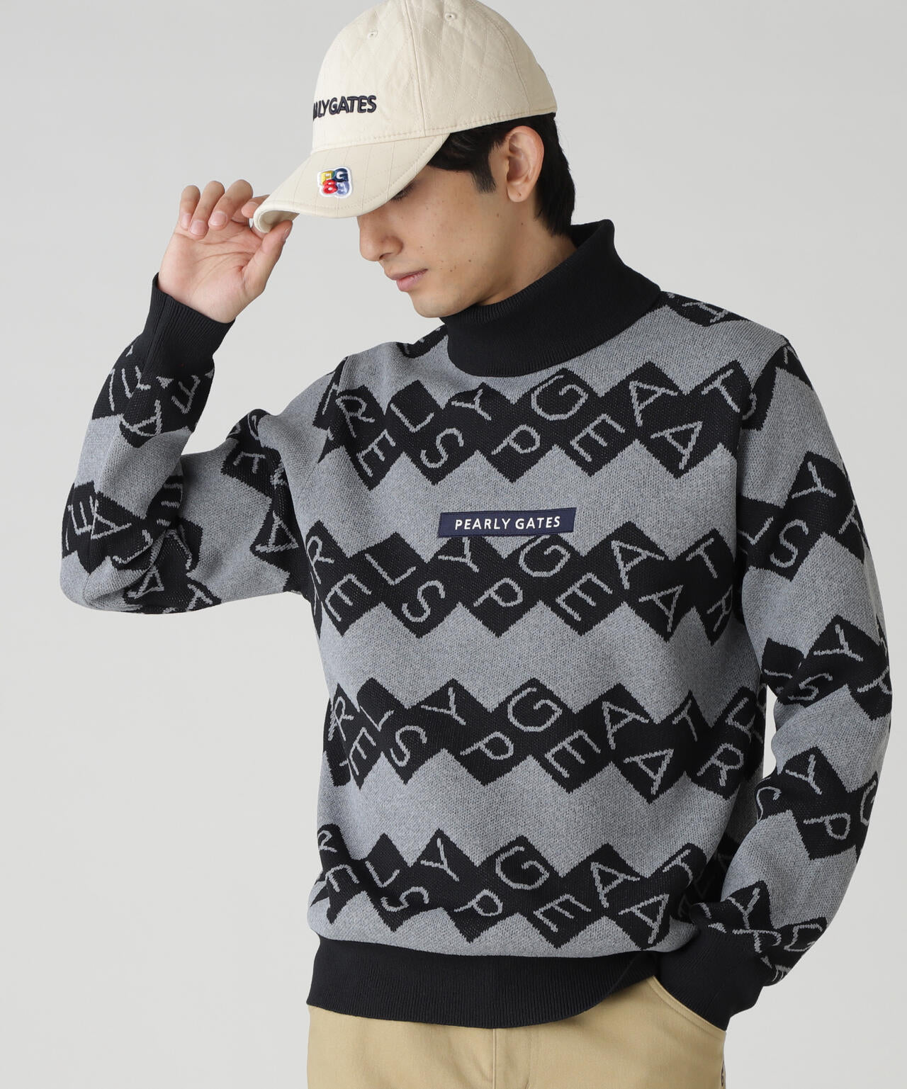 ダブルJQロゴギザボーダー柄タートルニットプルオーバー