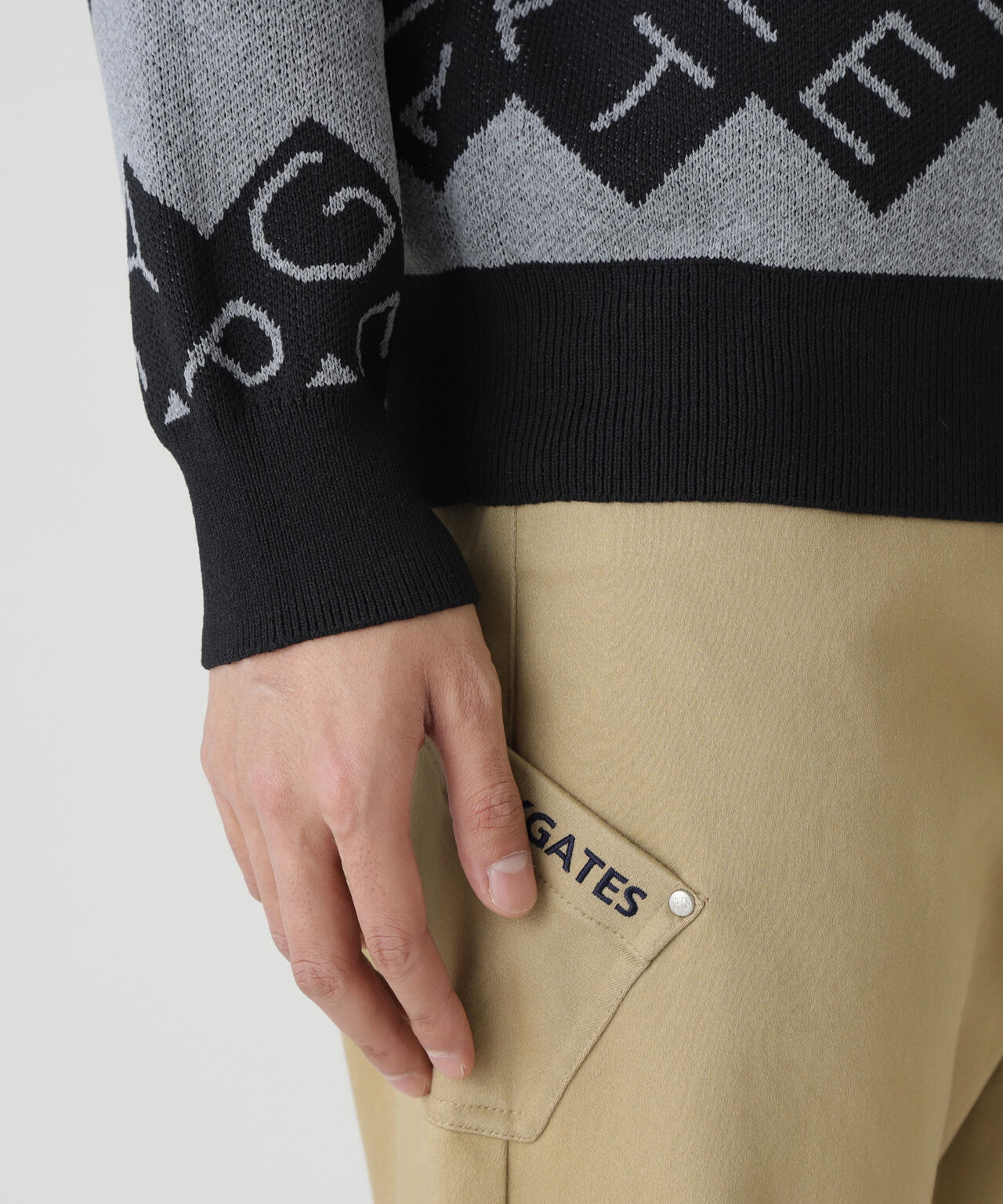 ダブルJQロゴギザボーダー柄タートルニットプルオーバー