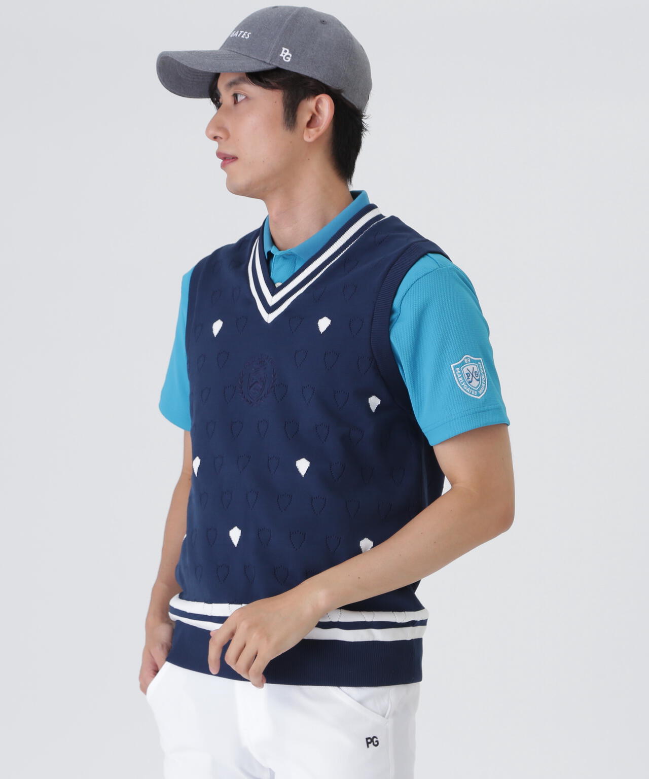リバーシブルVネックニットベスト ＜エンブレム総柄＞ (MENS) | PEARLY