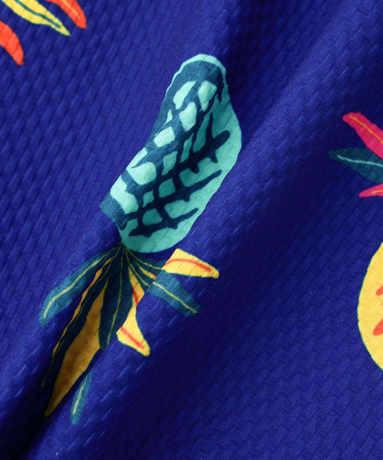 46G75d PBTドビーポロシャツ ＜パイナップルアート柄＞