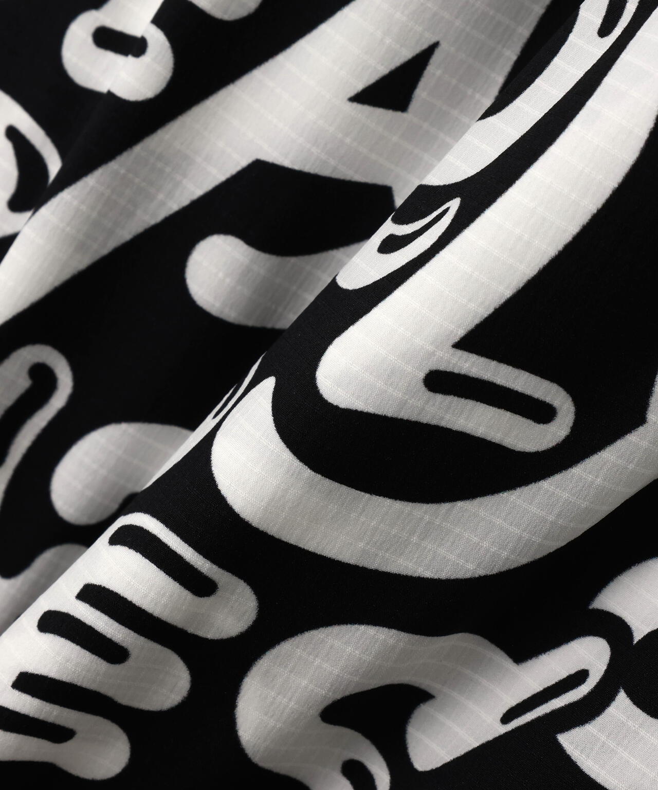 Nyストレッチリップストップ×超KARUISHI中綿リバーシブルスタンドブルゾン ＜ぷにぷにロゴ柄＞