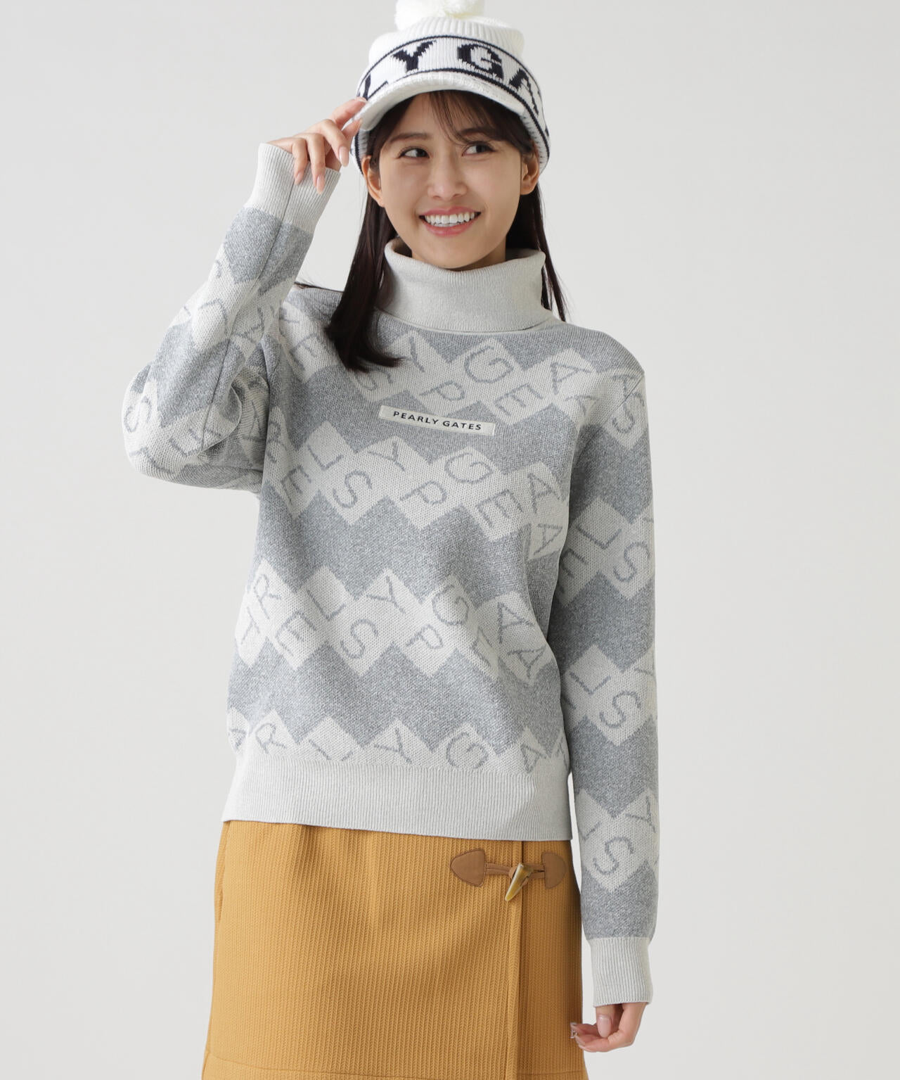 ダブルJQロゴギザボーダー柄タートルネックニットプルオーバー