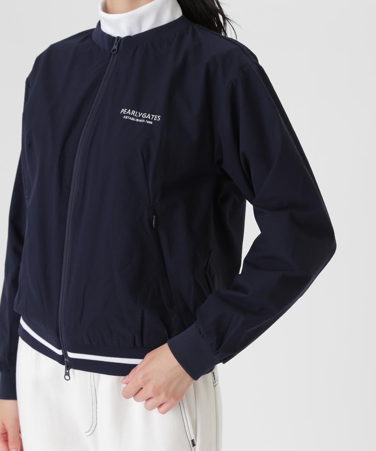 Peメカニカルストレッチ手裏剣ジャガードクルーネックブルゾン (WOMENS