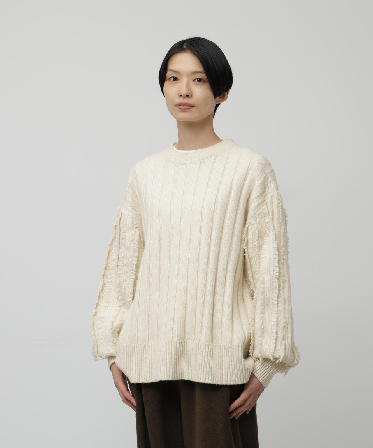 フリンジ袖ニットプルオーバー