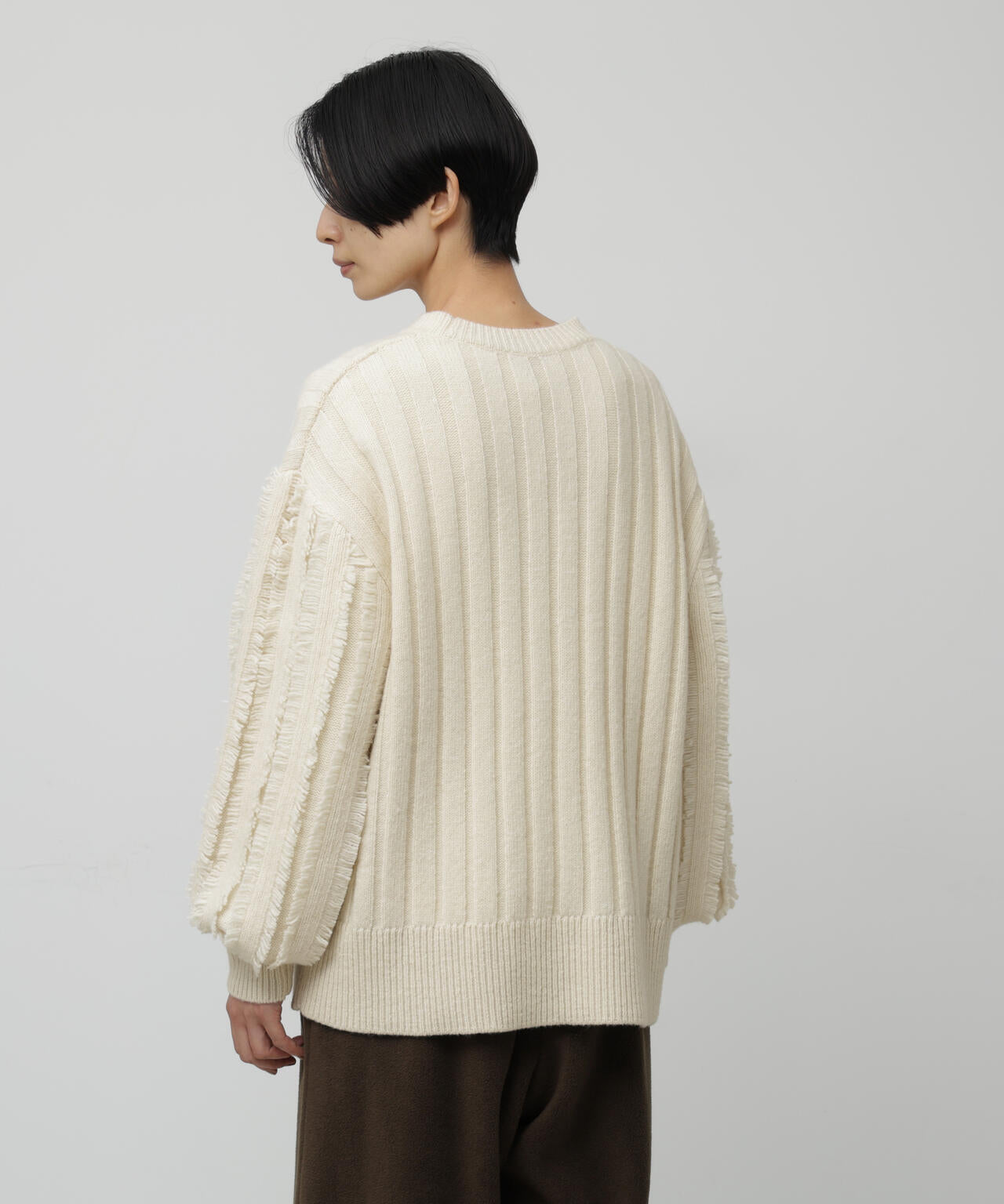 フリンジ袖ニットプルオーバー
