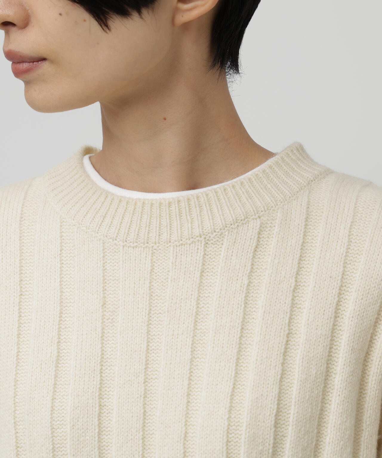 フリンジ袖ニットプルオーバー