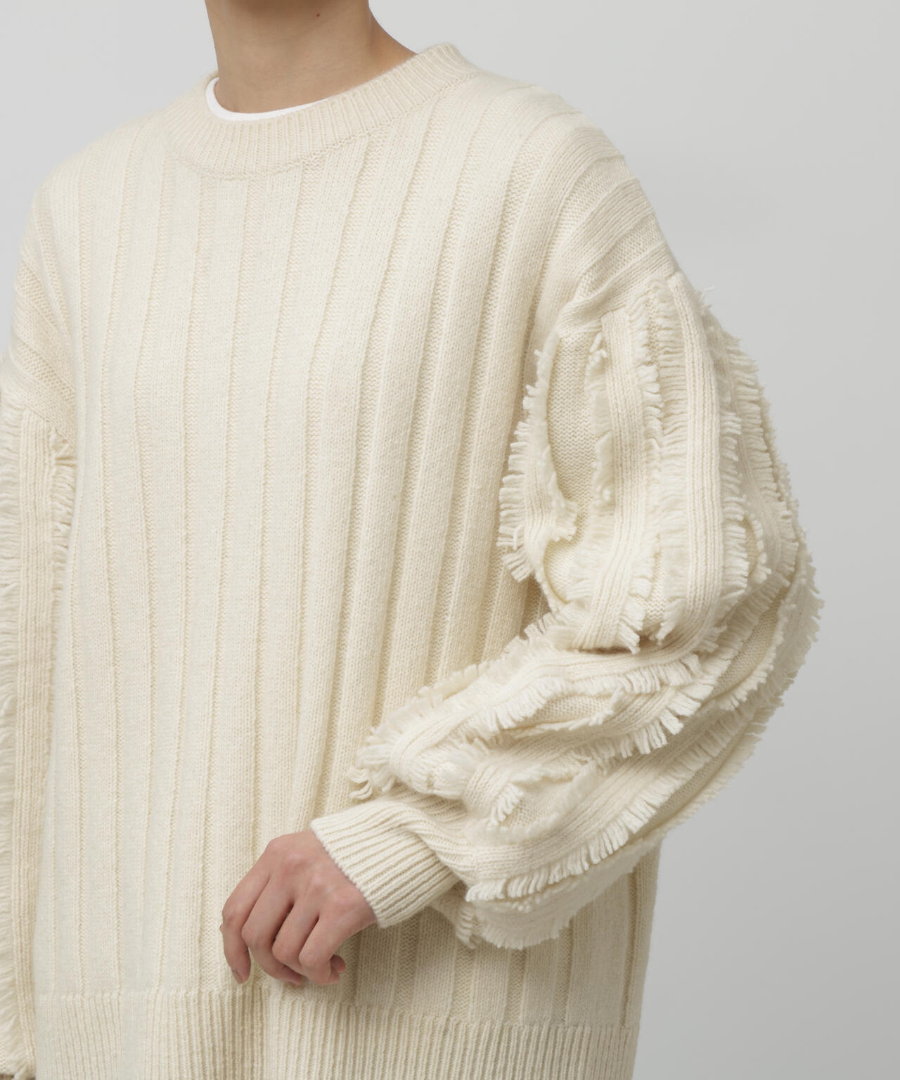 フリンジ袖ニットプルオーバー