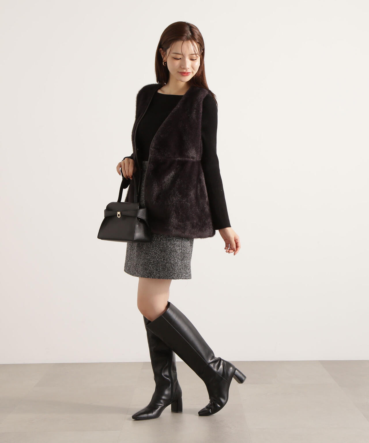 フェイクファーペプラムジレ