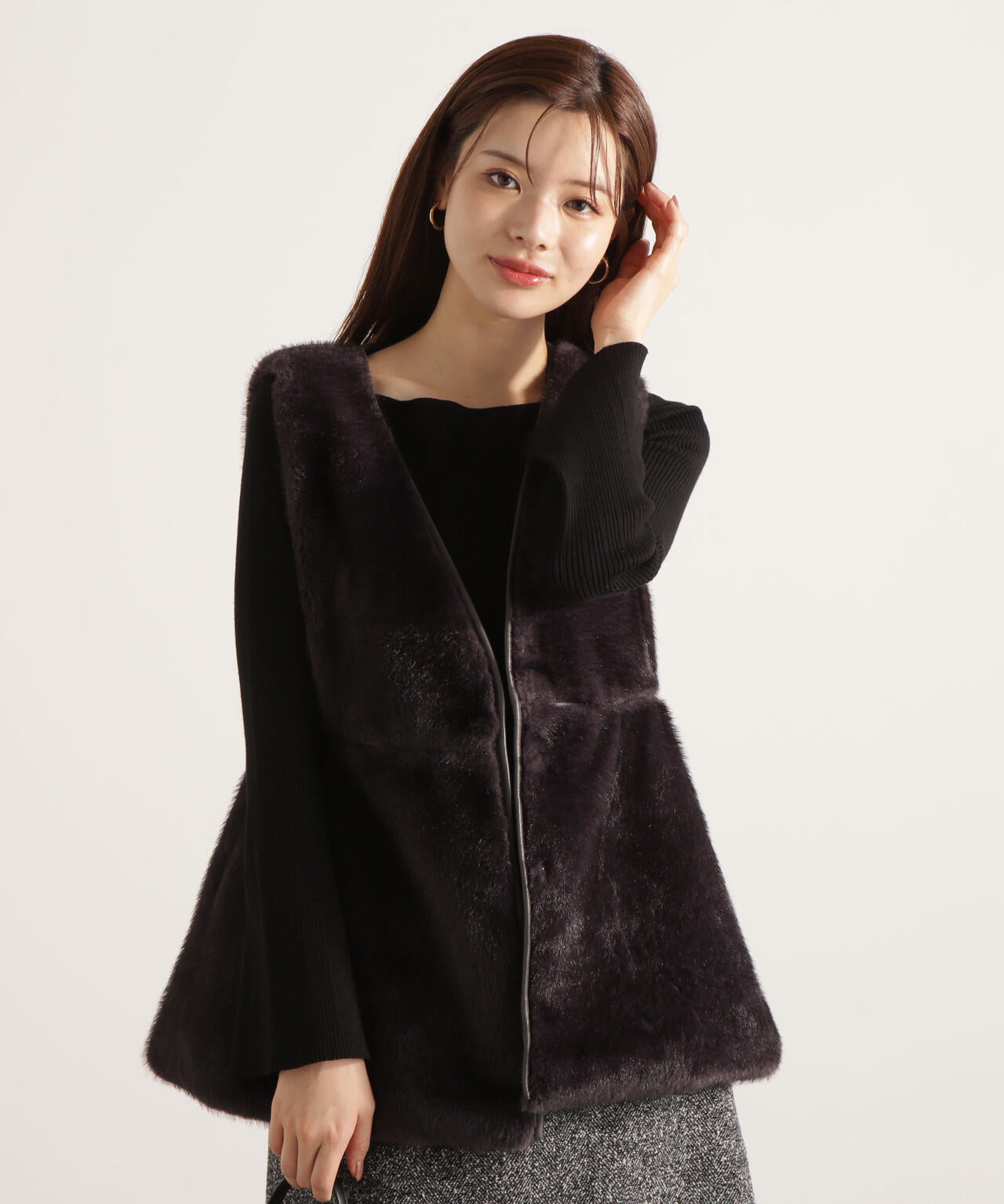 フェイクファーペプラムジレ