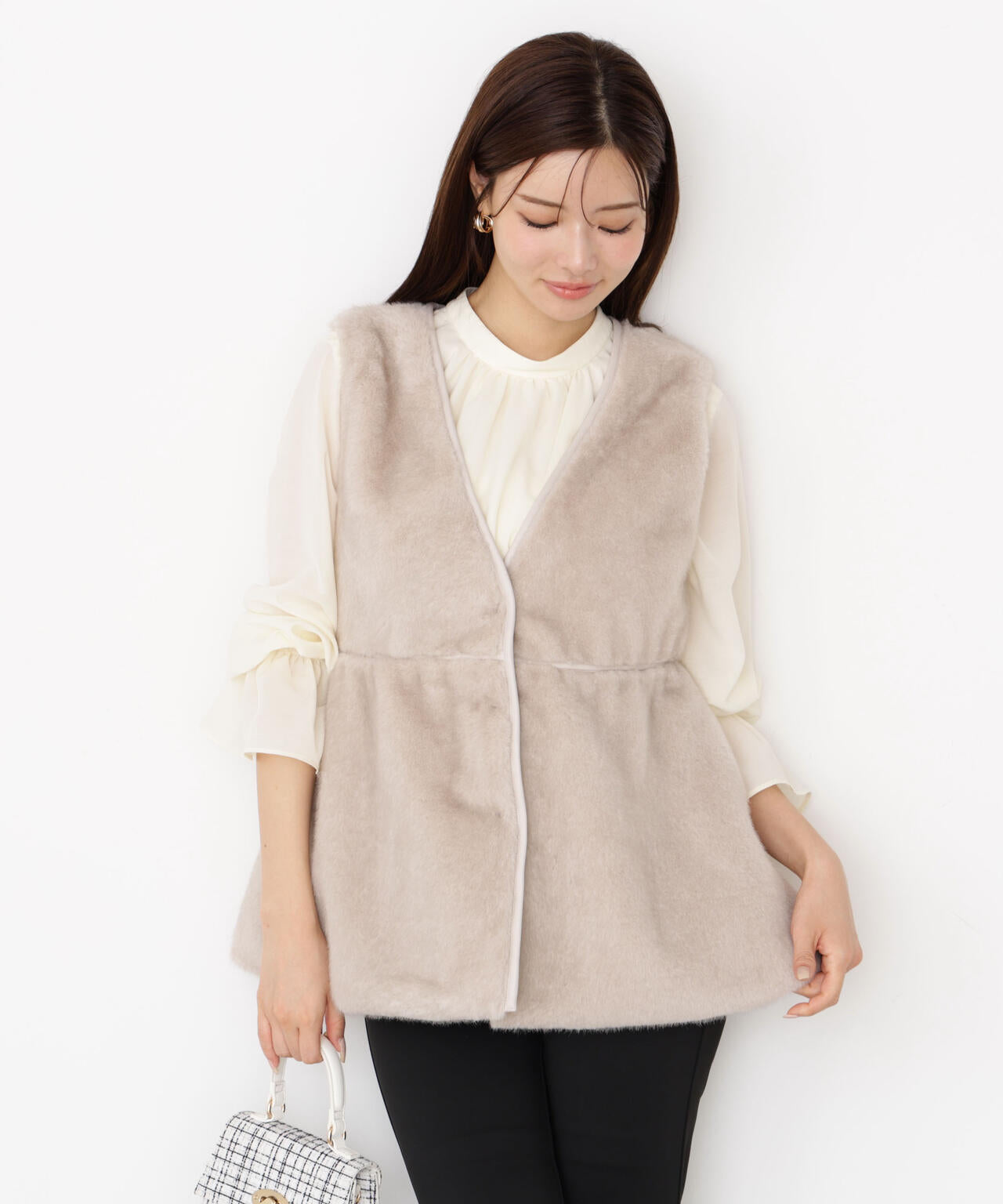 フェイクファーペプラムジレ