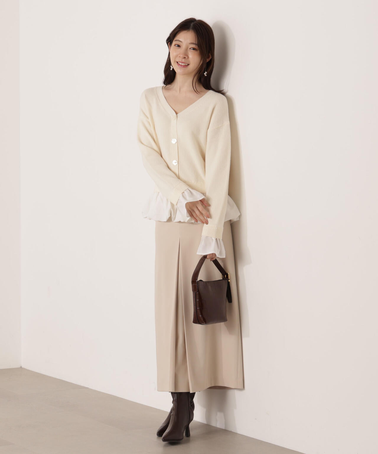 ＜ウォッシャブル＞バルーンペプラムニット