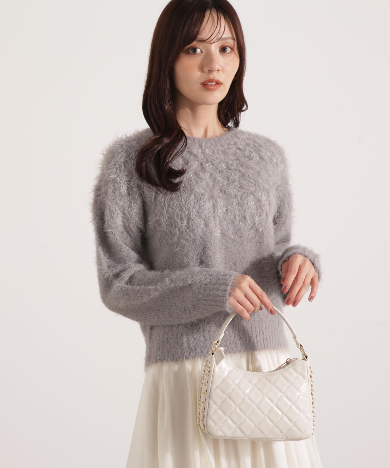 ラメ入り求心柄ニット