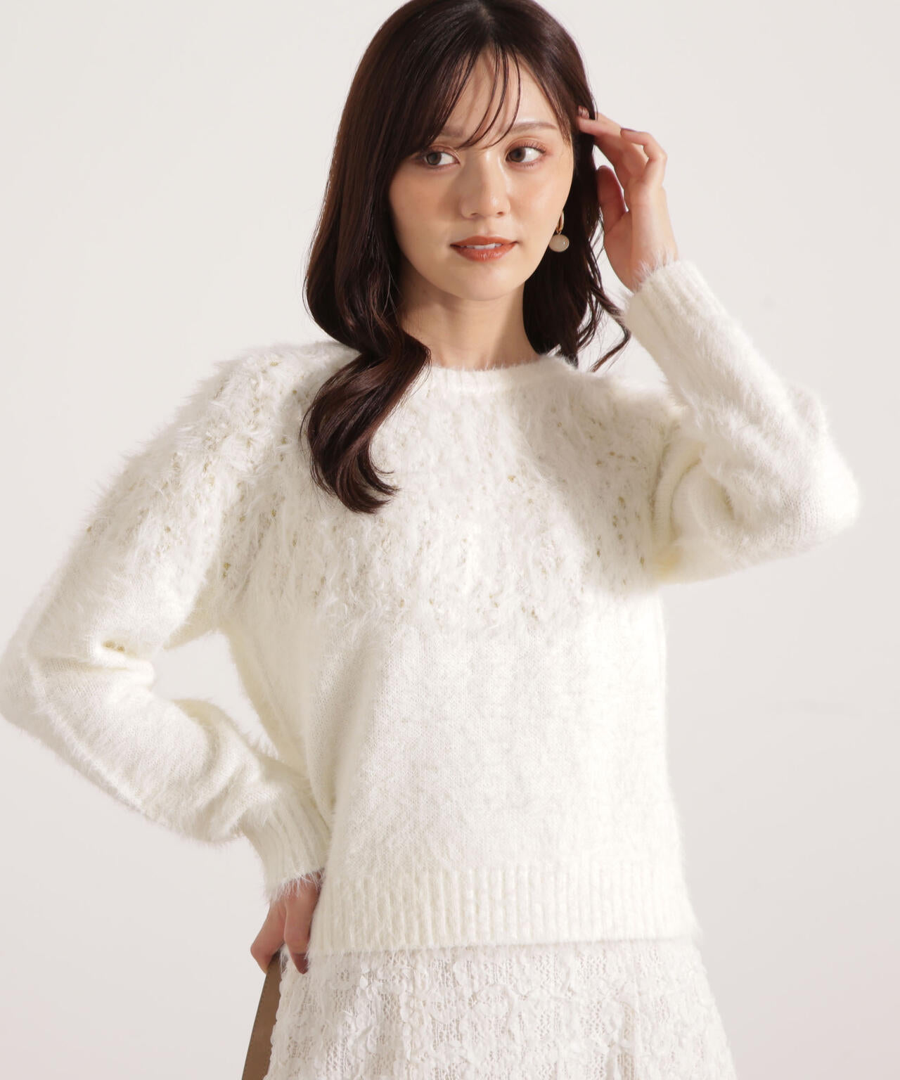 ラメ入り求心柄ニット