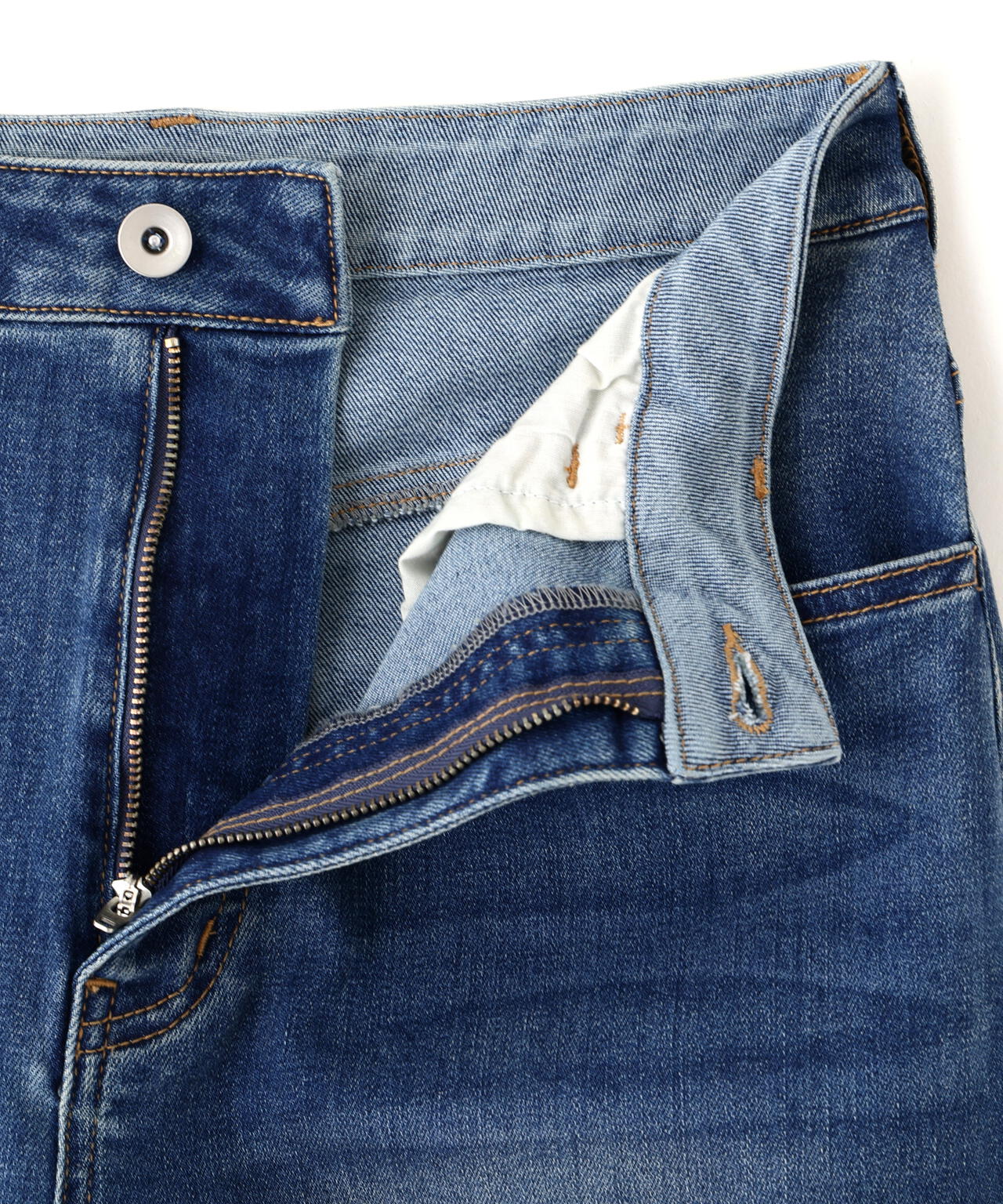 〈a/mie〉カーブデニムパンツ