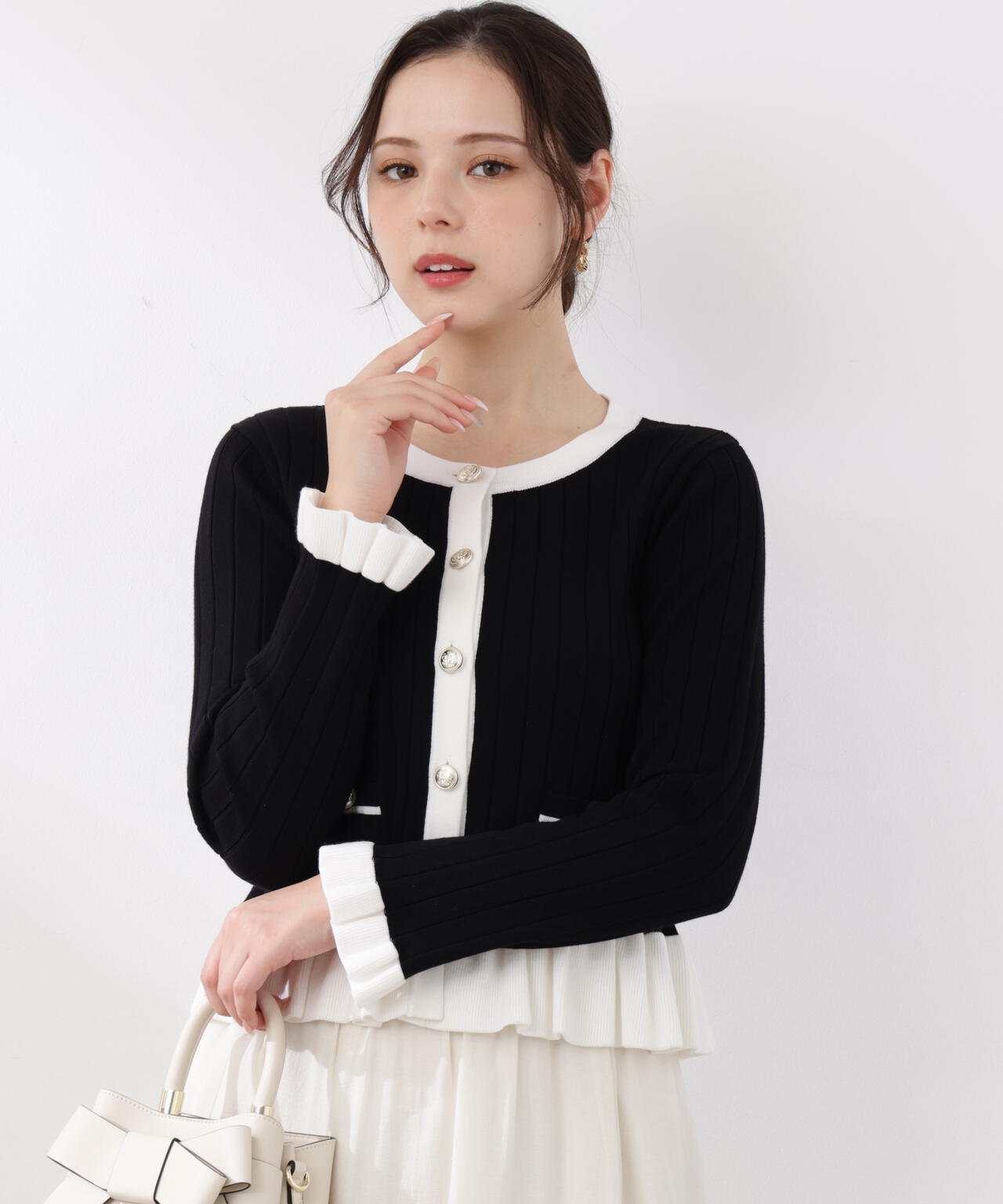 ＜ウォッシャブル/UV＞ボタン付きペプラムニット【ラベンダー：official site・一部店舗限定】