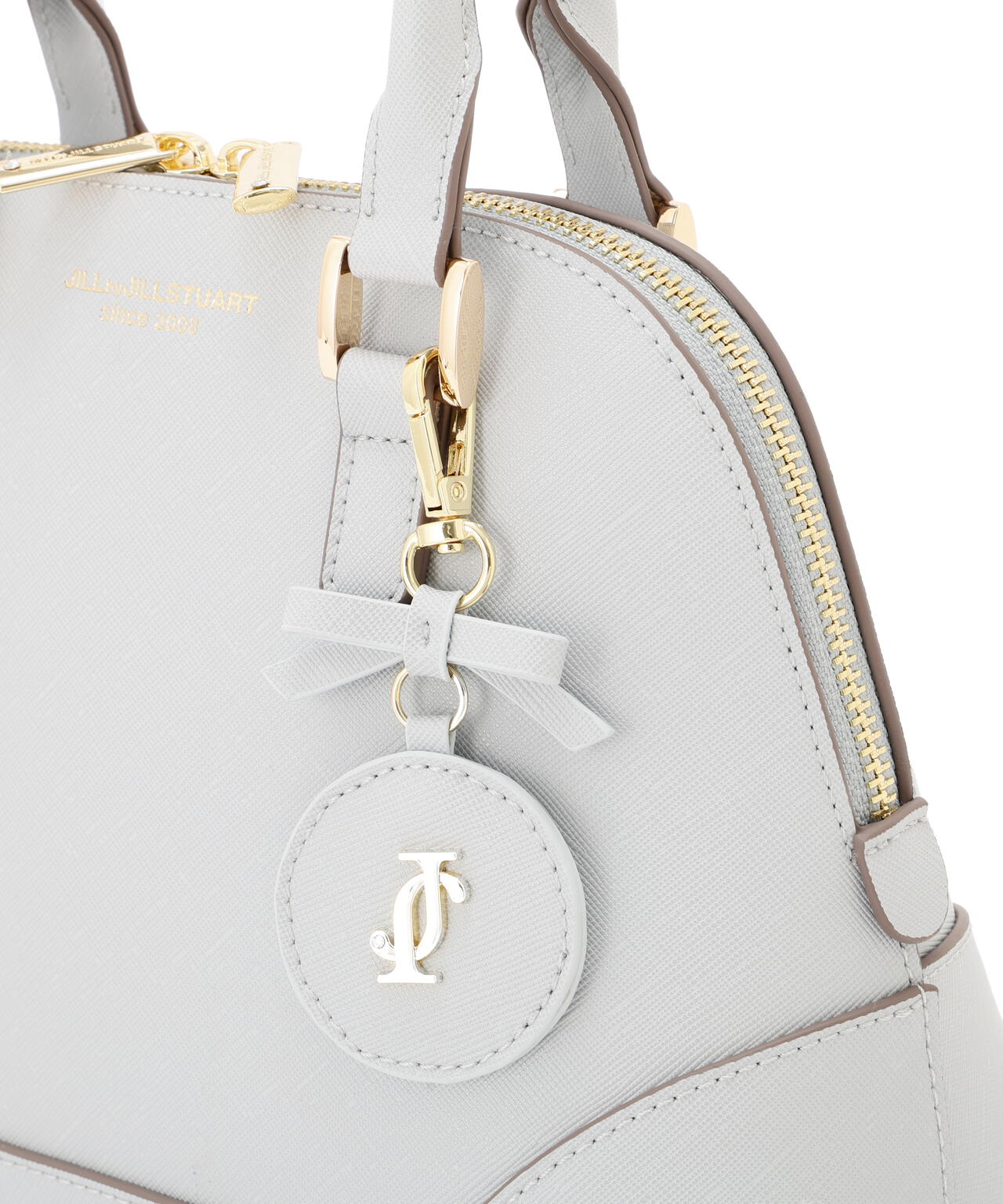 チャーム付きハンドバッグ