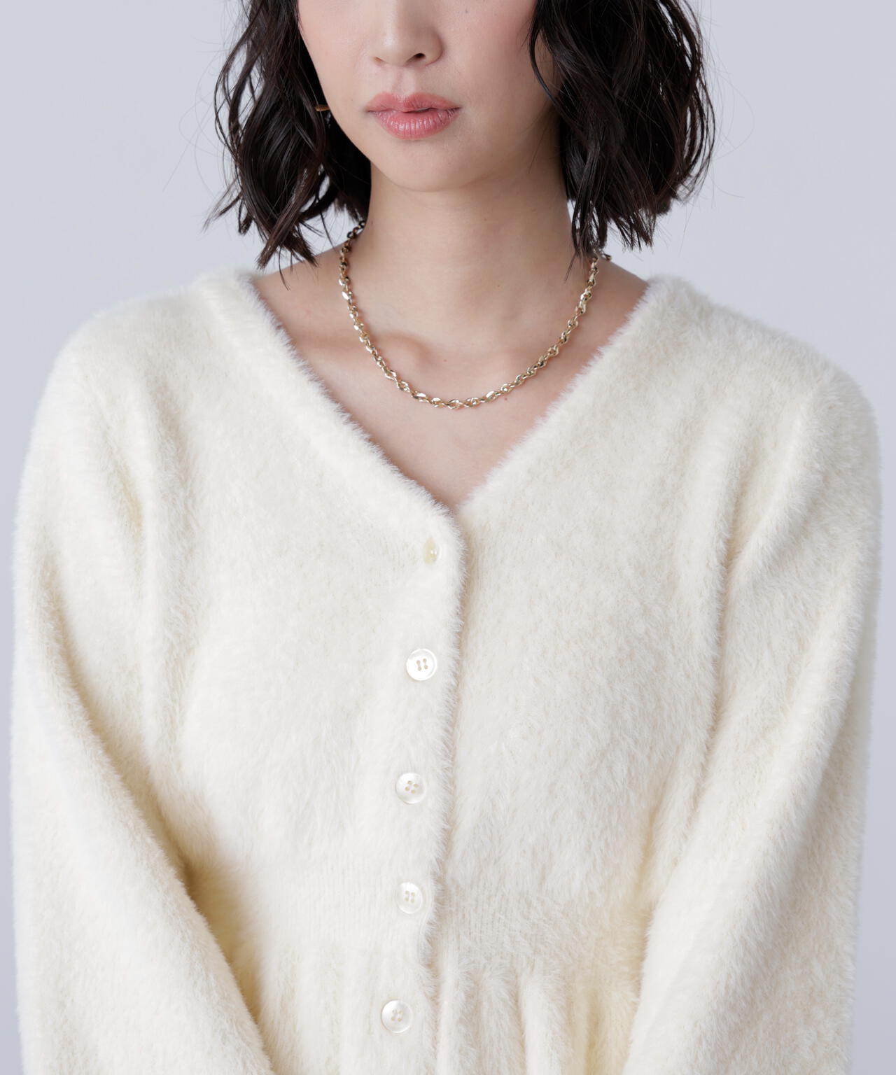 ショートシャギーペプラムニットカーディガン