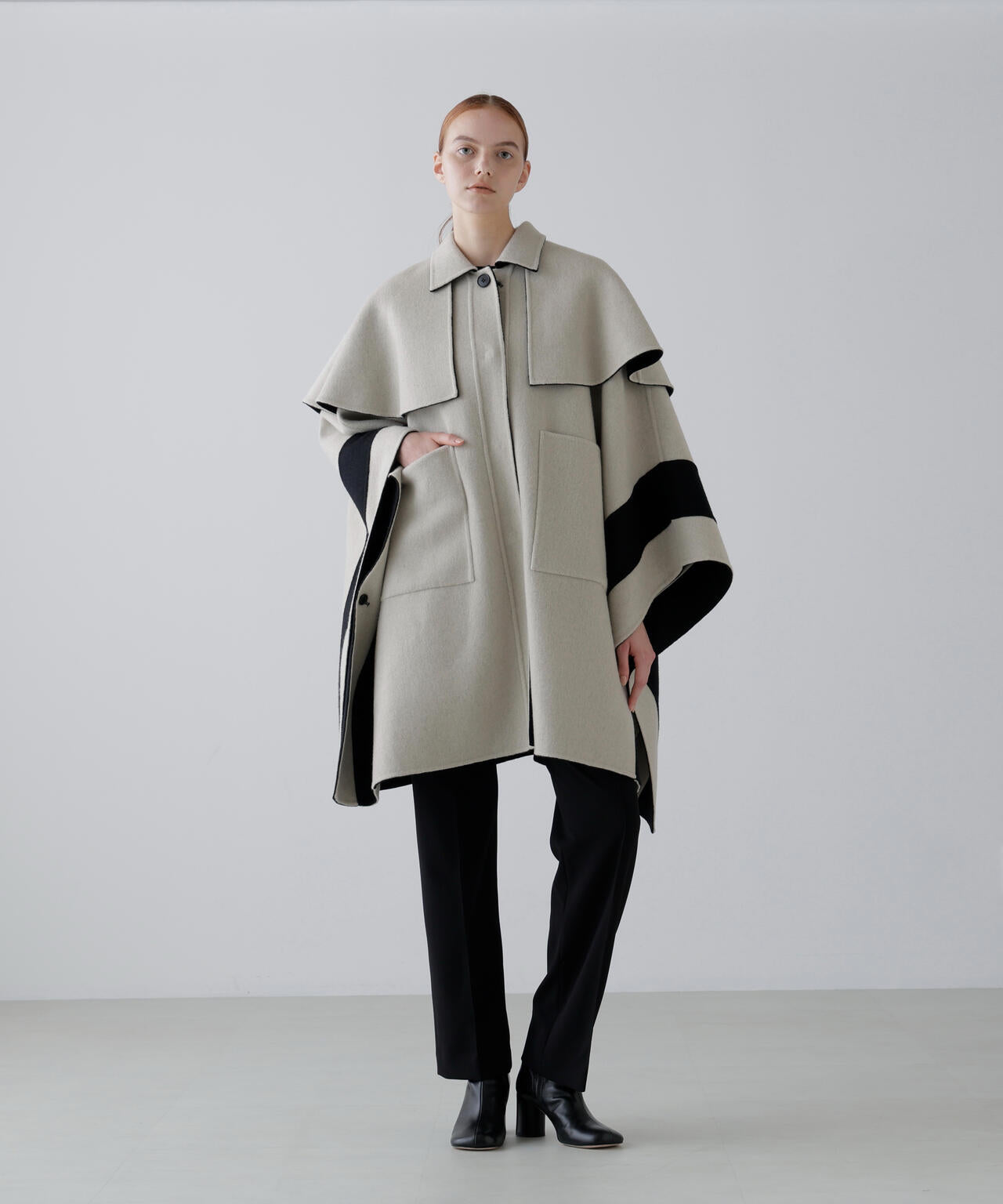 Ｃａ混２ＴＯＮＥリバーケープコート