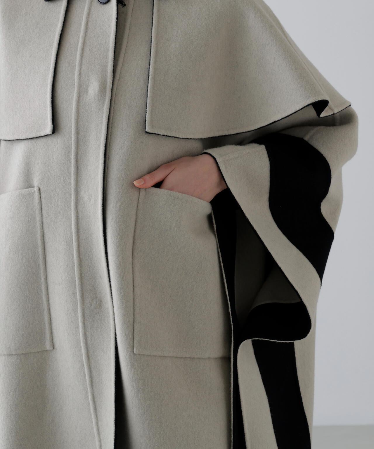 Ｃａ混２ＴＯＮＥリバーケープコート