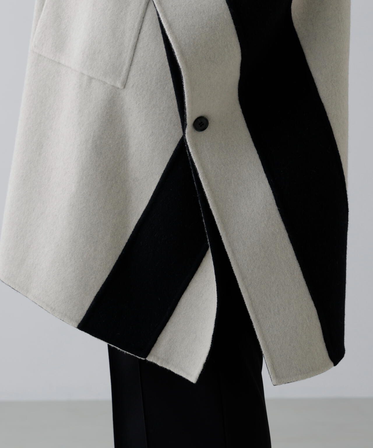 Ｃａ混２ＴＯＮＥリバーケープコート