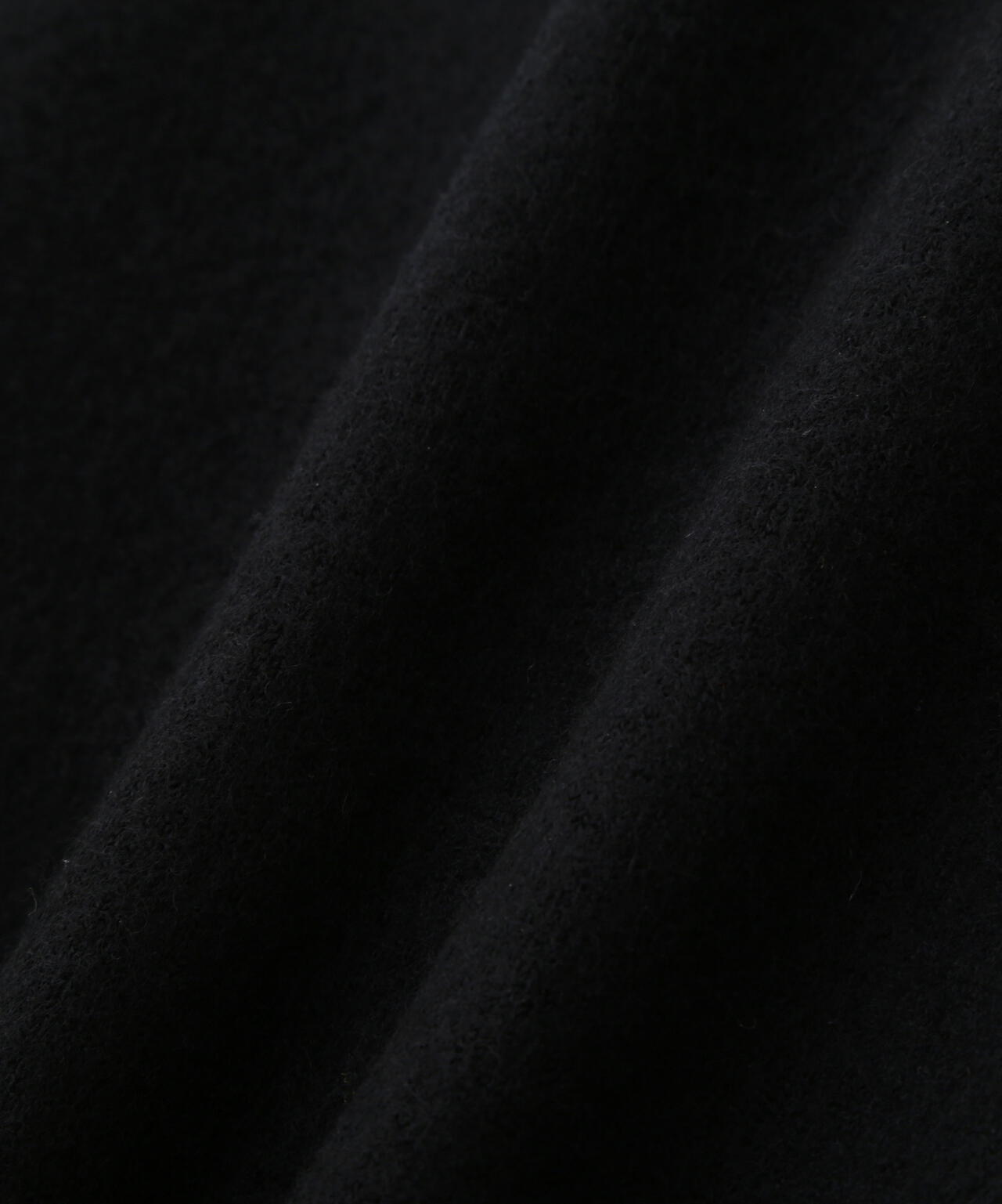 FELTED ROUGH WOOL KNITWEAR