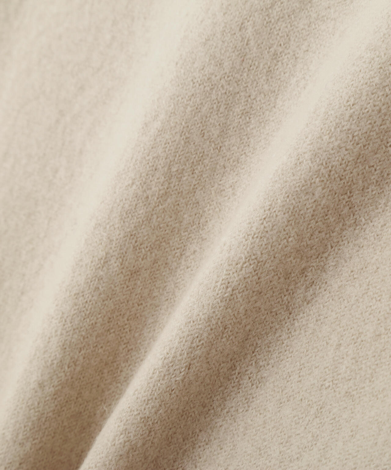 FELTED ROUGH WOOL KNITWEAR