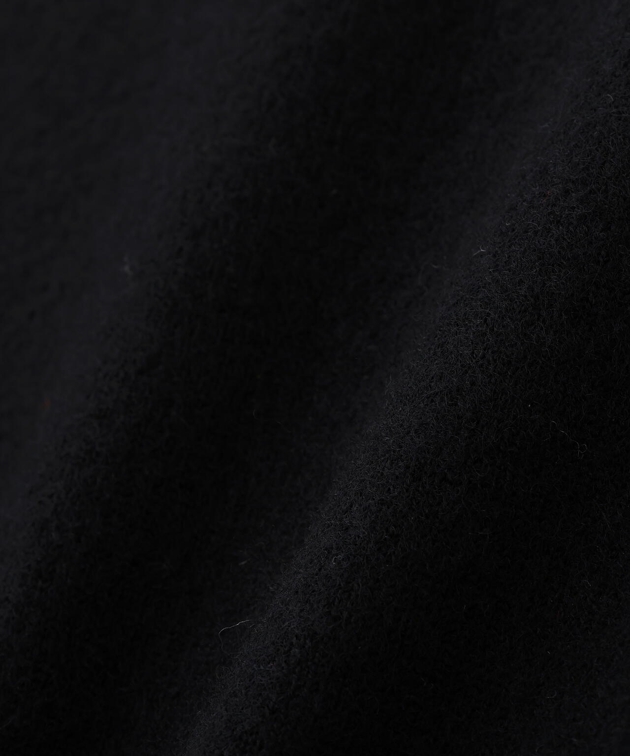 FELTED ROUGH WOOL KNITWEAR