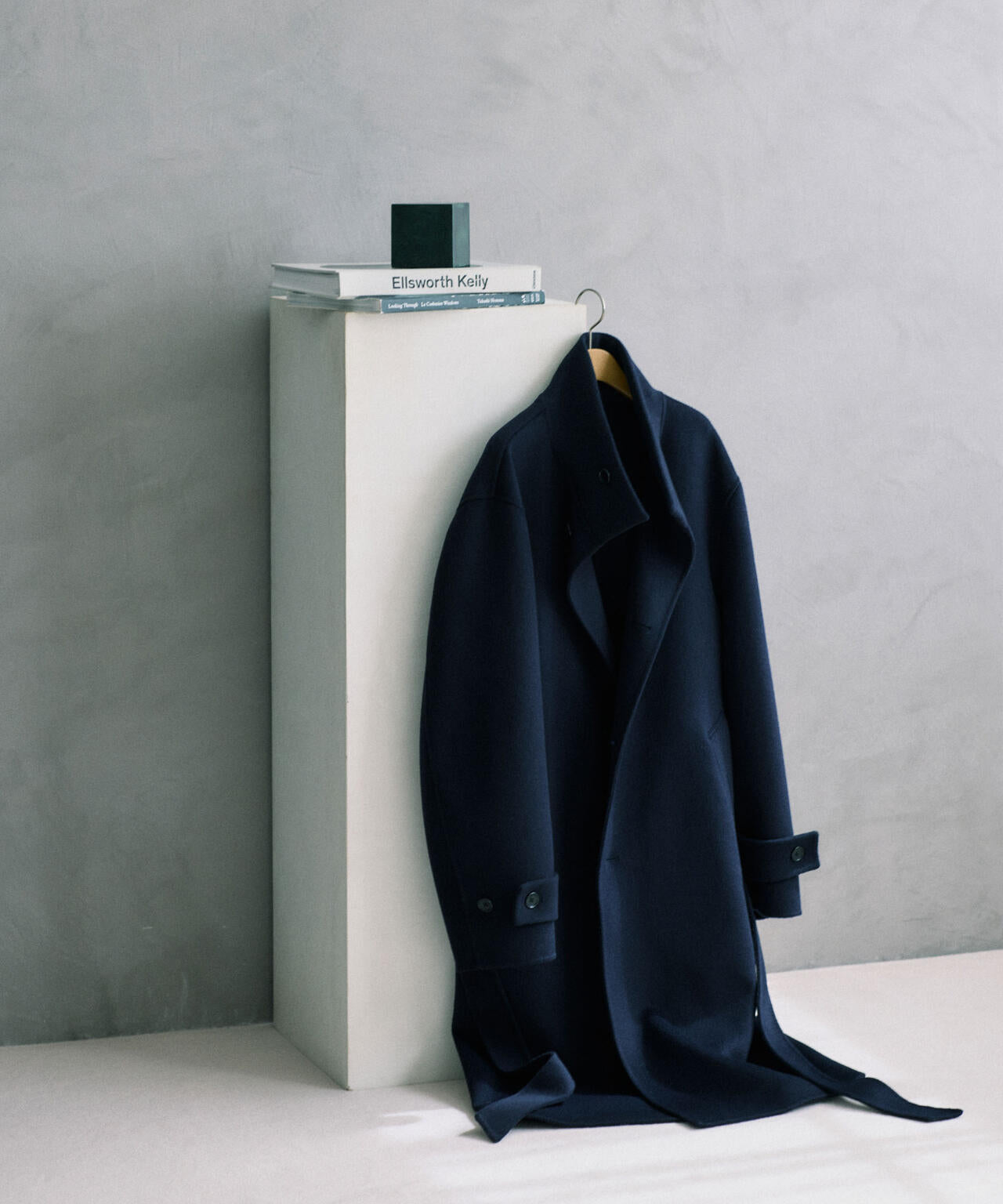 ウールリバースタンドベルテッドコート