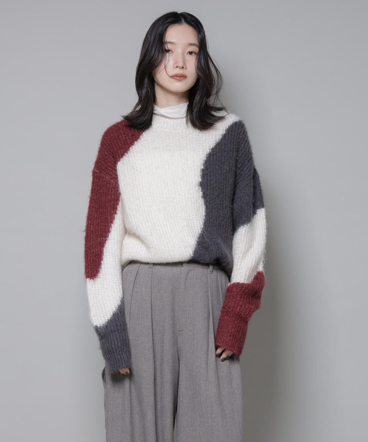 モヘヤ起毛カーブパターンブロッキングニット