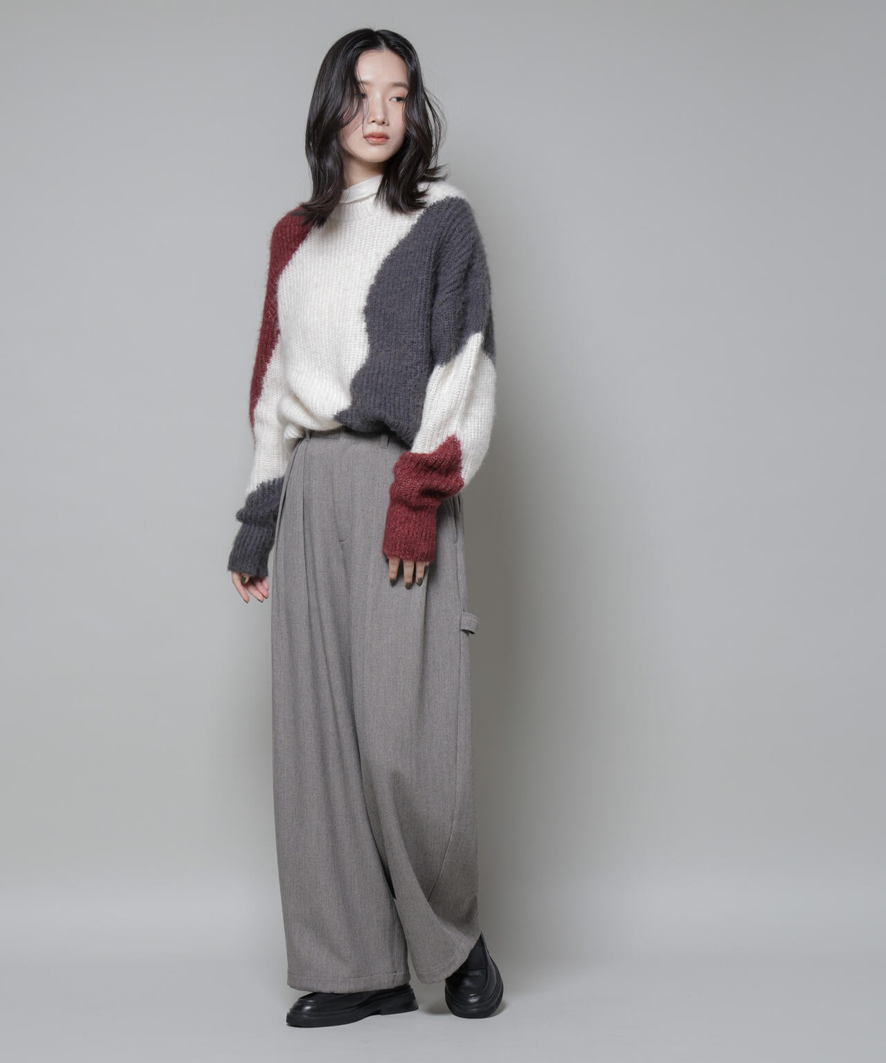 モヘヤ起毛カーブパターンブロッキングニット