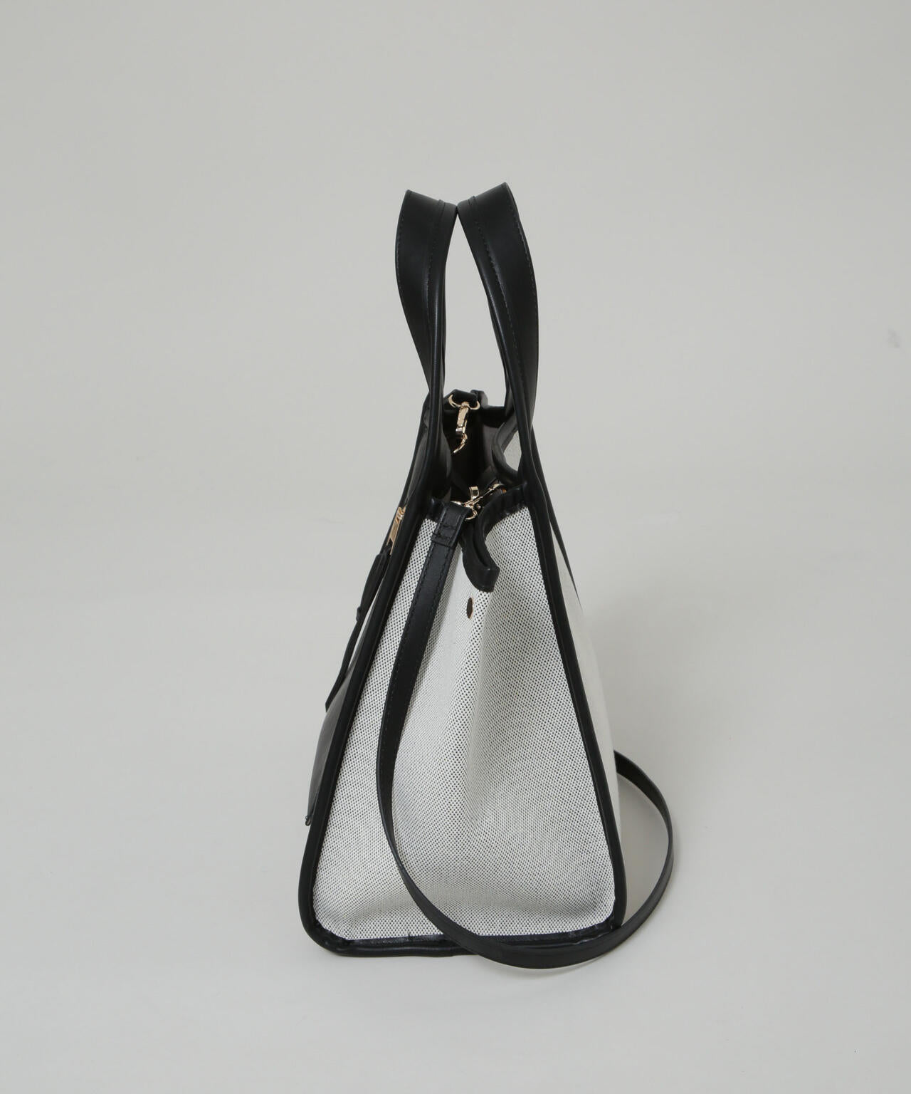 キャンバス×フェイクレザーポケットバッグ