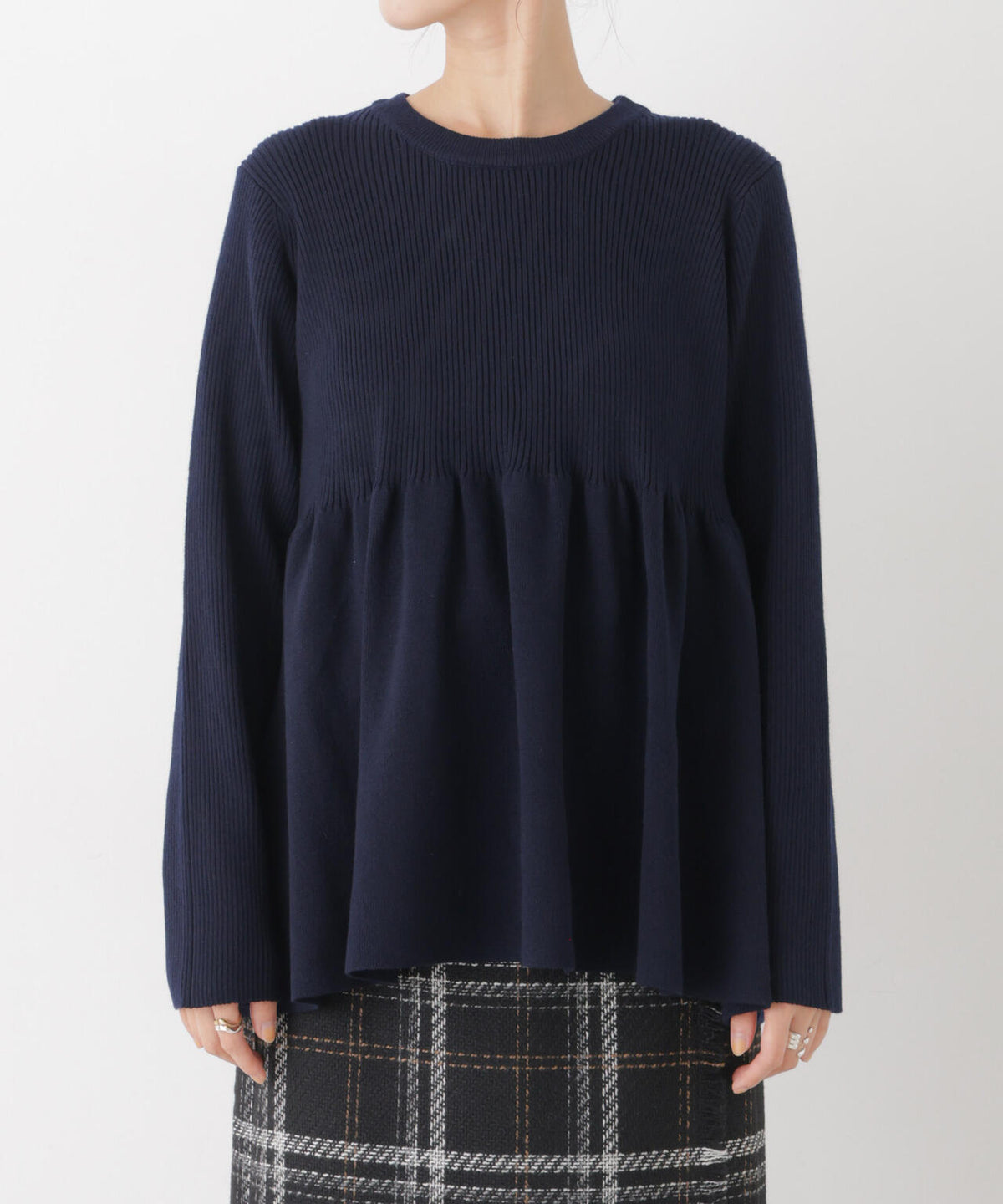 ペプラムニットトップス