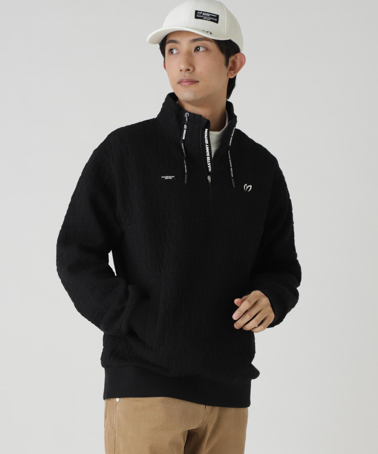 ロゴキルトジャガードハーフジップアップ