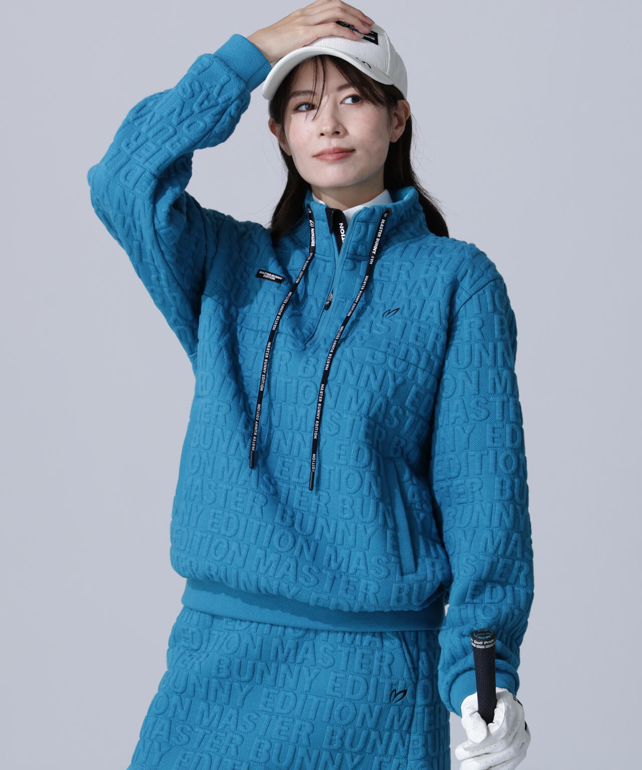 ロゴキルトジャガードハーフジップアップ