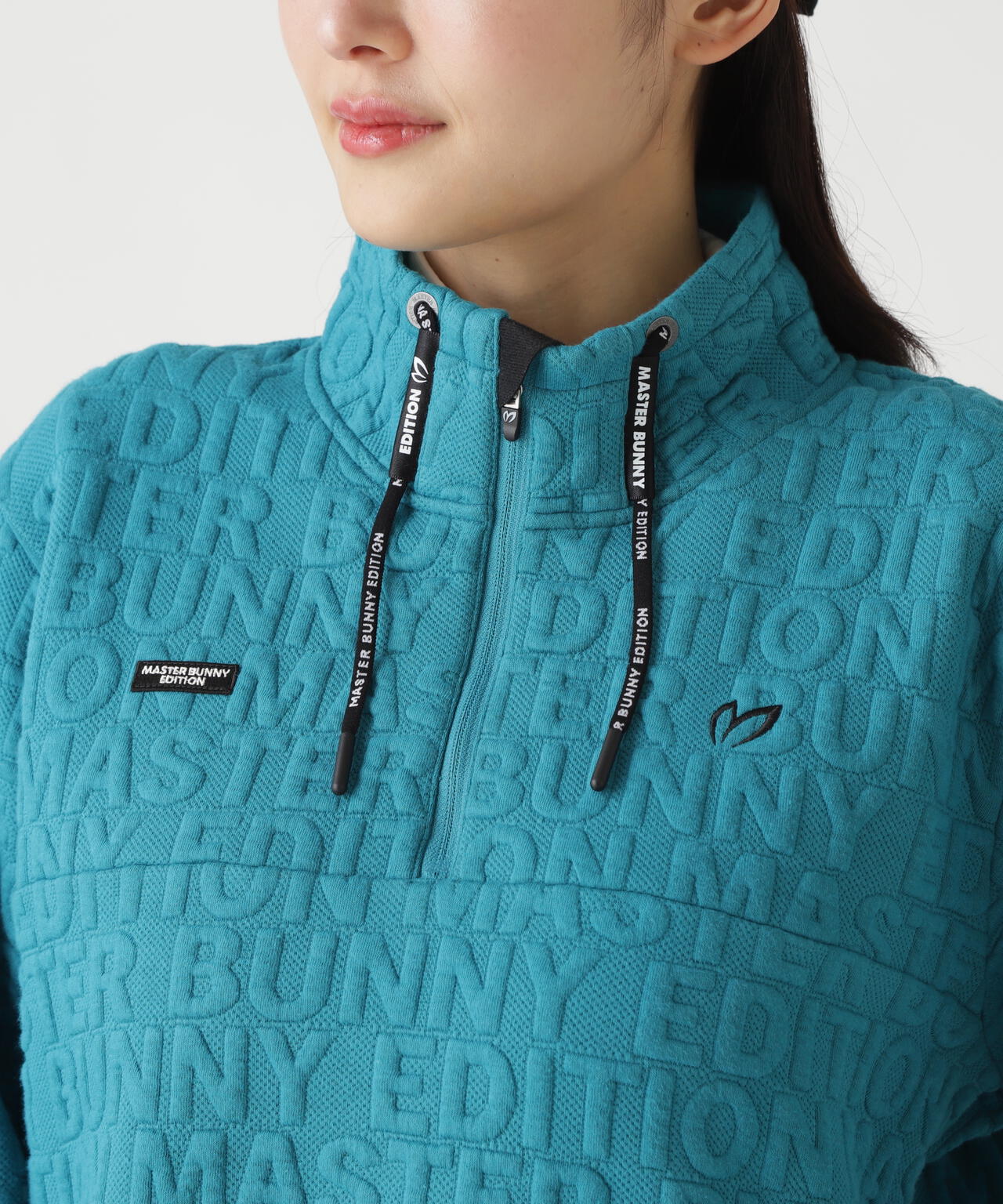 ロゴキルトジャガードハーフジップアップ