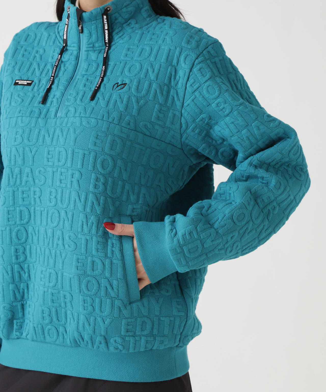 ロゴキルトジャガードハーフジップアップ