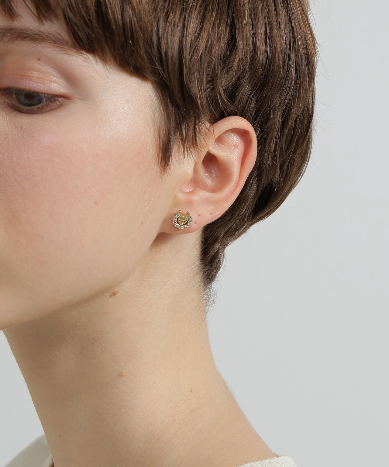 HEART HORSESHOE CZ EARRING by J.H.M CO.LTD. | AVIREX