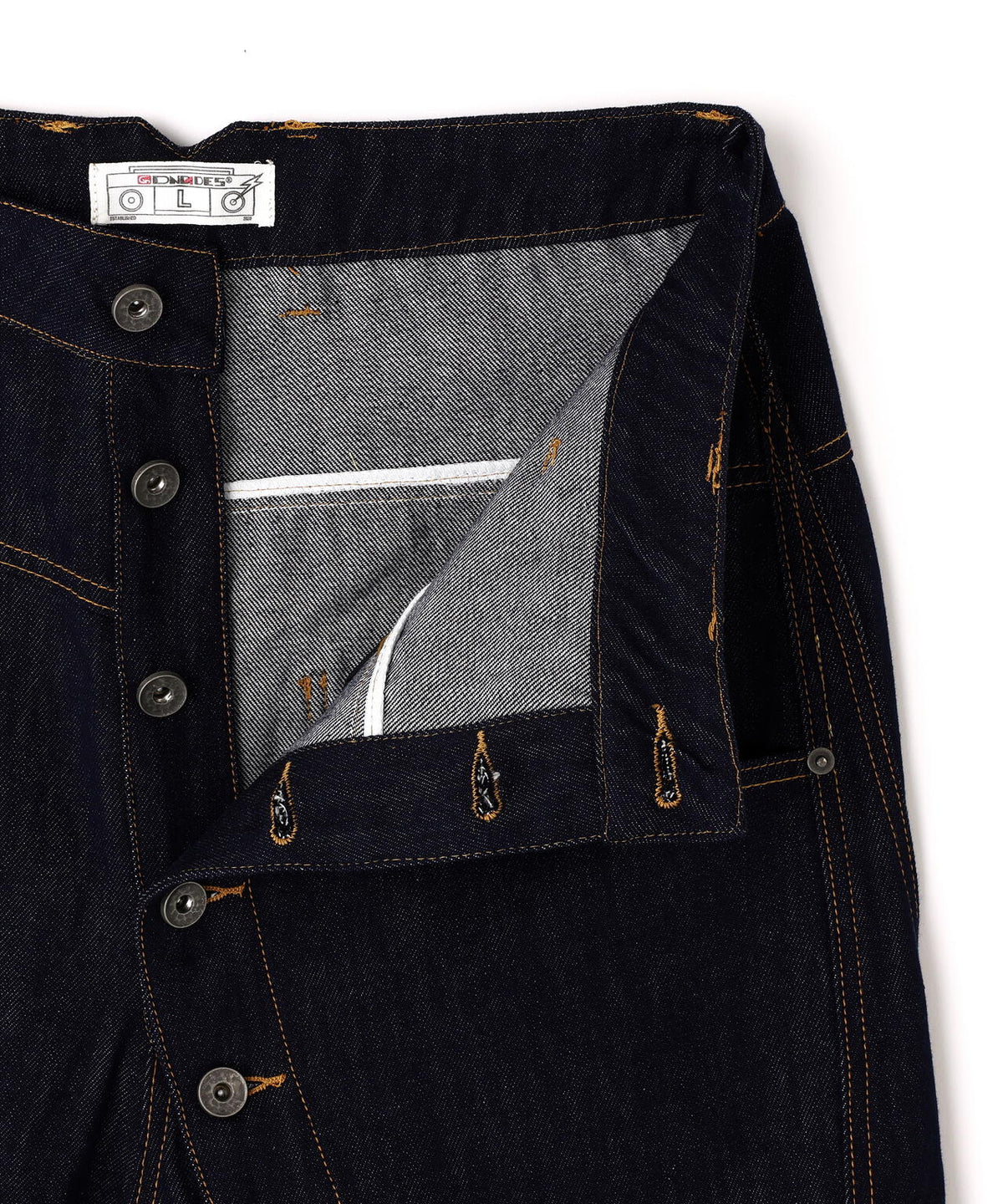 DND4DES/ディーエヌディーフォーデス/Avant-Garde Curved Button Raw Denim Jeans